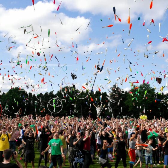 people throwing pins