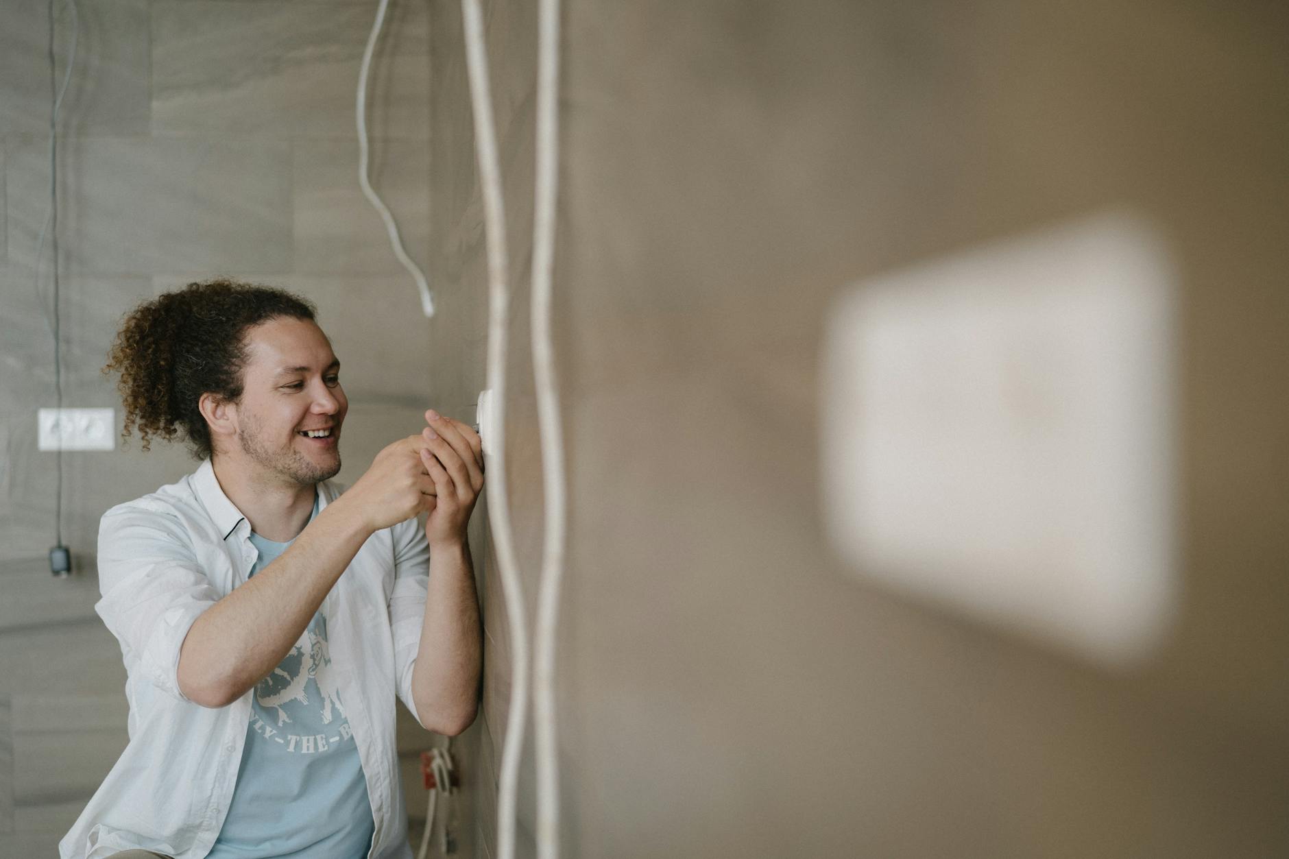 a man in white button up shirt smiling